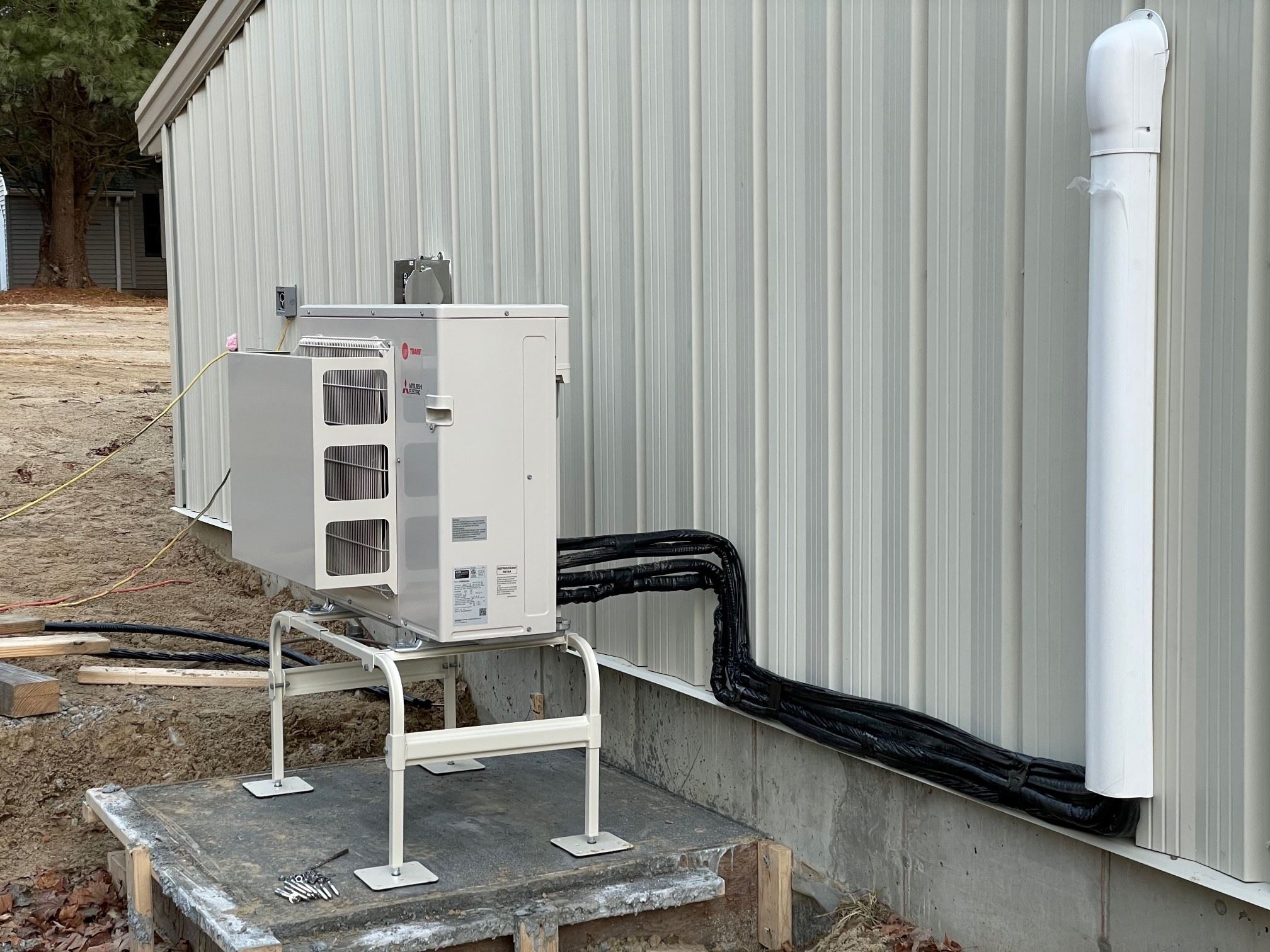 Installation of the Heat Pump and Piping at the Maintenance Garage Addition
